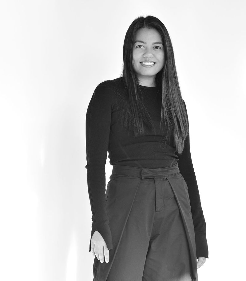 A Black and White profile photo of Rowena Dela Cruz.