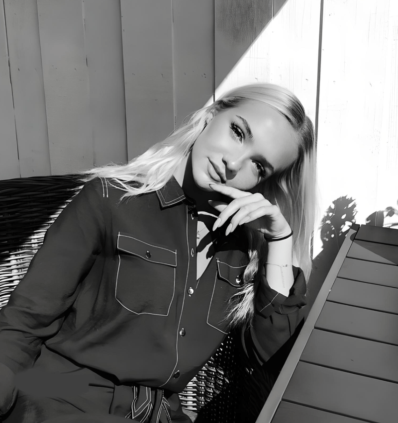A Black and White profile photo of Claire Haudrechy.